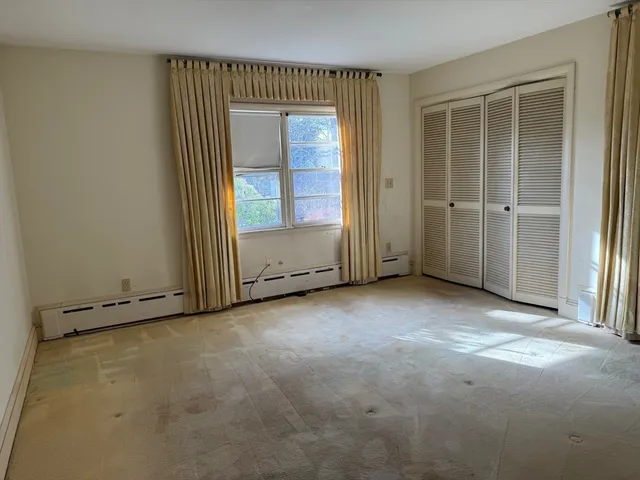 an empty room with windows