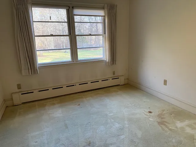 an empty room with a window