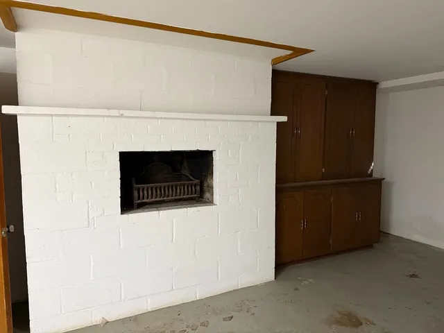 a living room with a fireplace