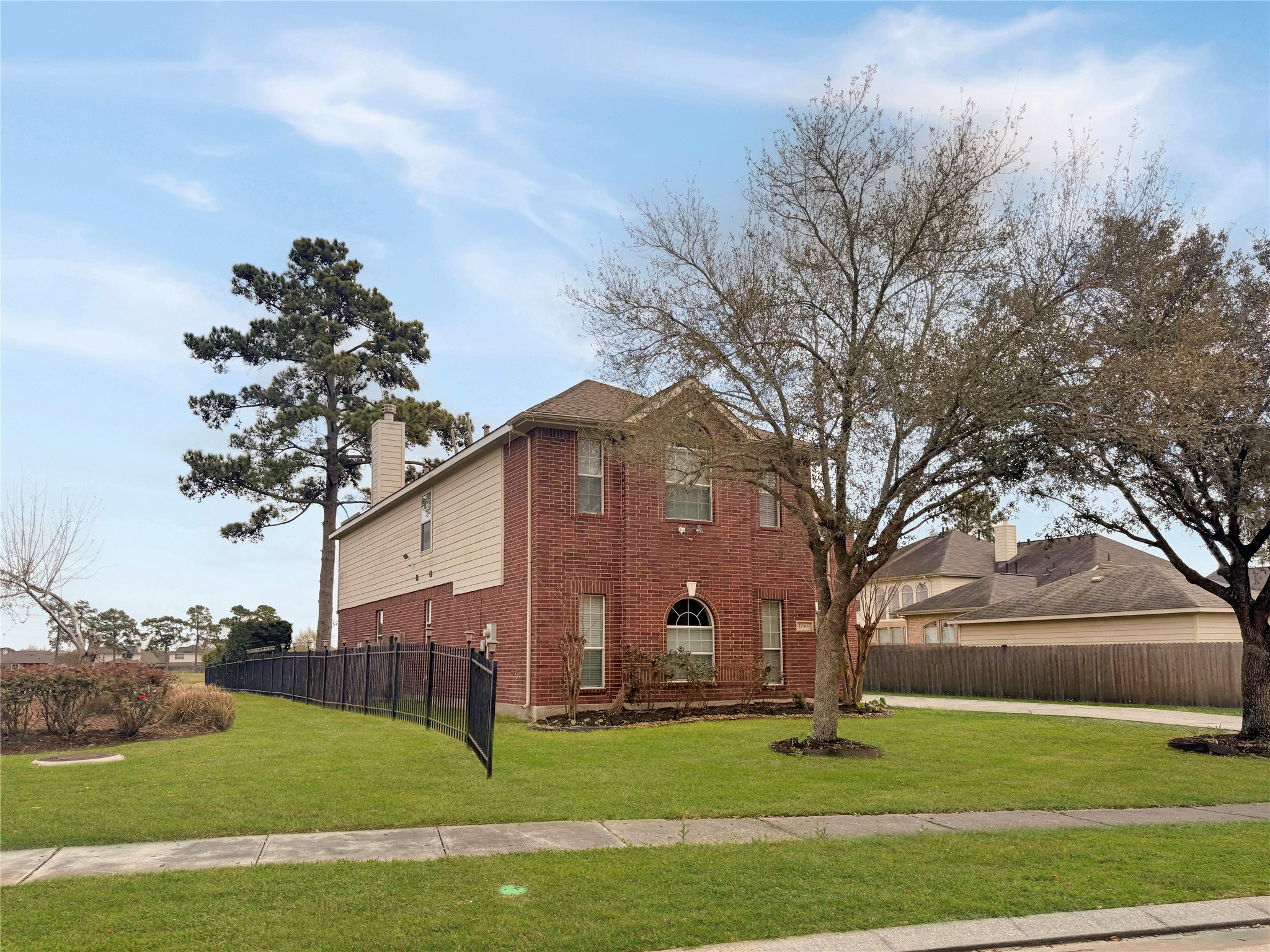 19414 Countryroad Dr Spring Spring, TX 77388 - Photo 2 of 8 a view of a house with a yard