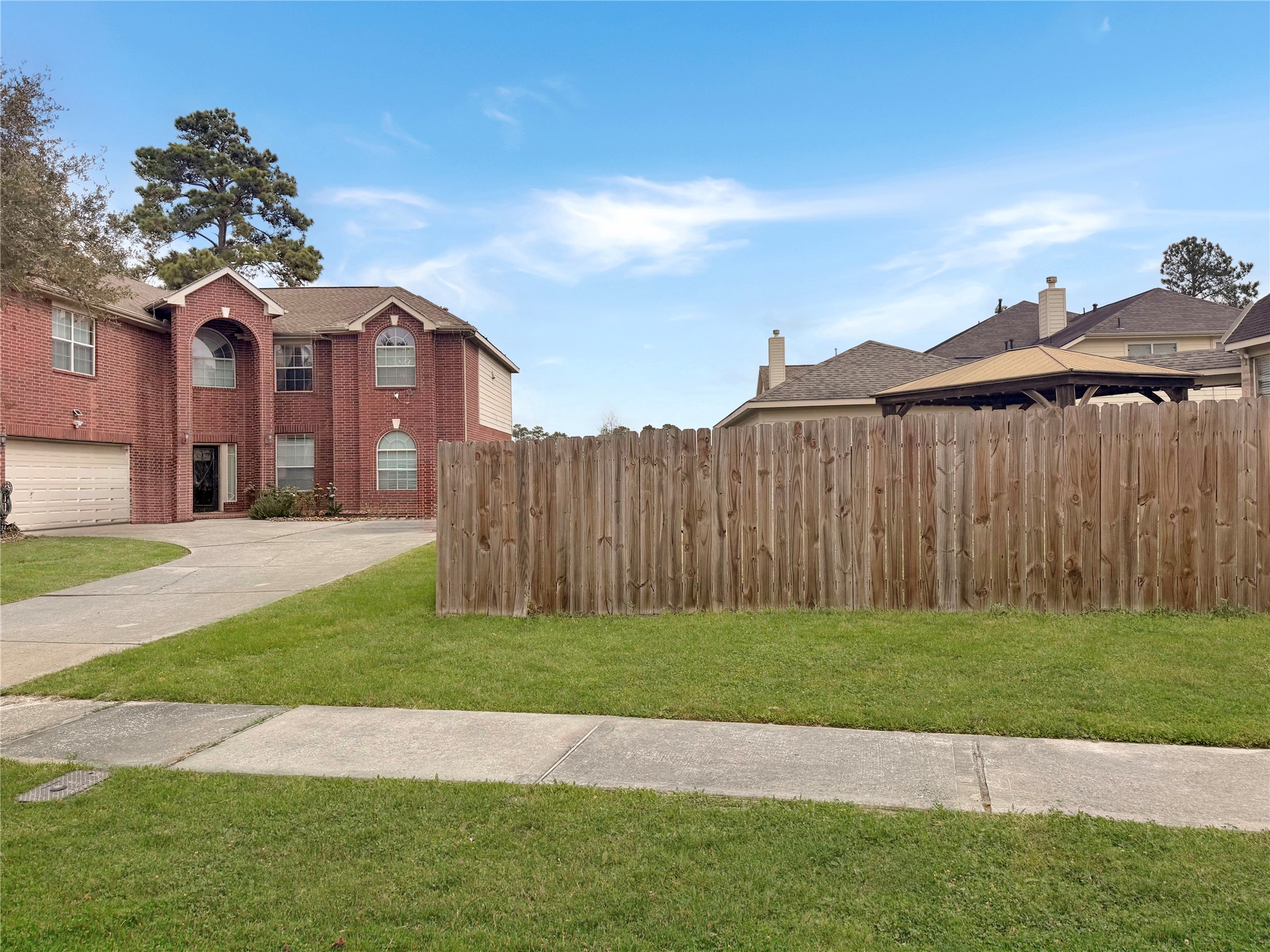 19414 Countryroad Dr Spring Spring, TX 77388 - Photo 6 of 8 a view of a house with a yard