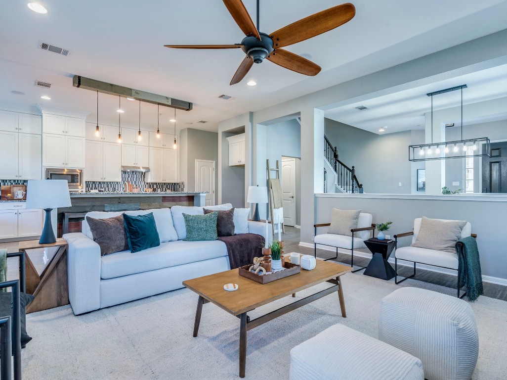 2930 Grand Oaks Loop, Unit 1903 Cedar Park, TX 78613 - Photo 16 of 36 a living room with furniture and kitchen view