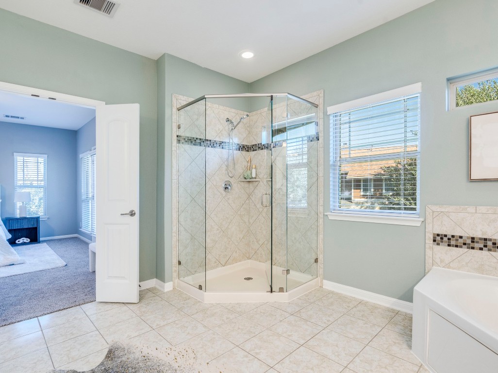 2930 Grand Oaks Loop, Unit 1903 Cedar Park, TX 78613 - Photo 24 of 36 a bathroom with a tub shower and sink