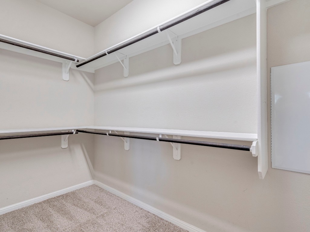 2930 Grand Oaks Loop, Unit 1903 Cedar Park, TX 78613 - Photo 25 of 36 a view of a room with racks on the wall