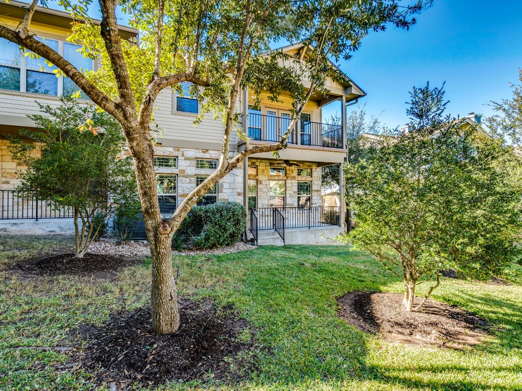 2930 Grand Oaks Loop, Unit 1903 Cedar Park, TX 78613 - Photo 34 of 36 a front view of a house with a yard