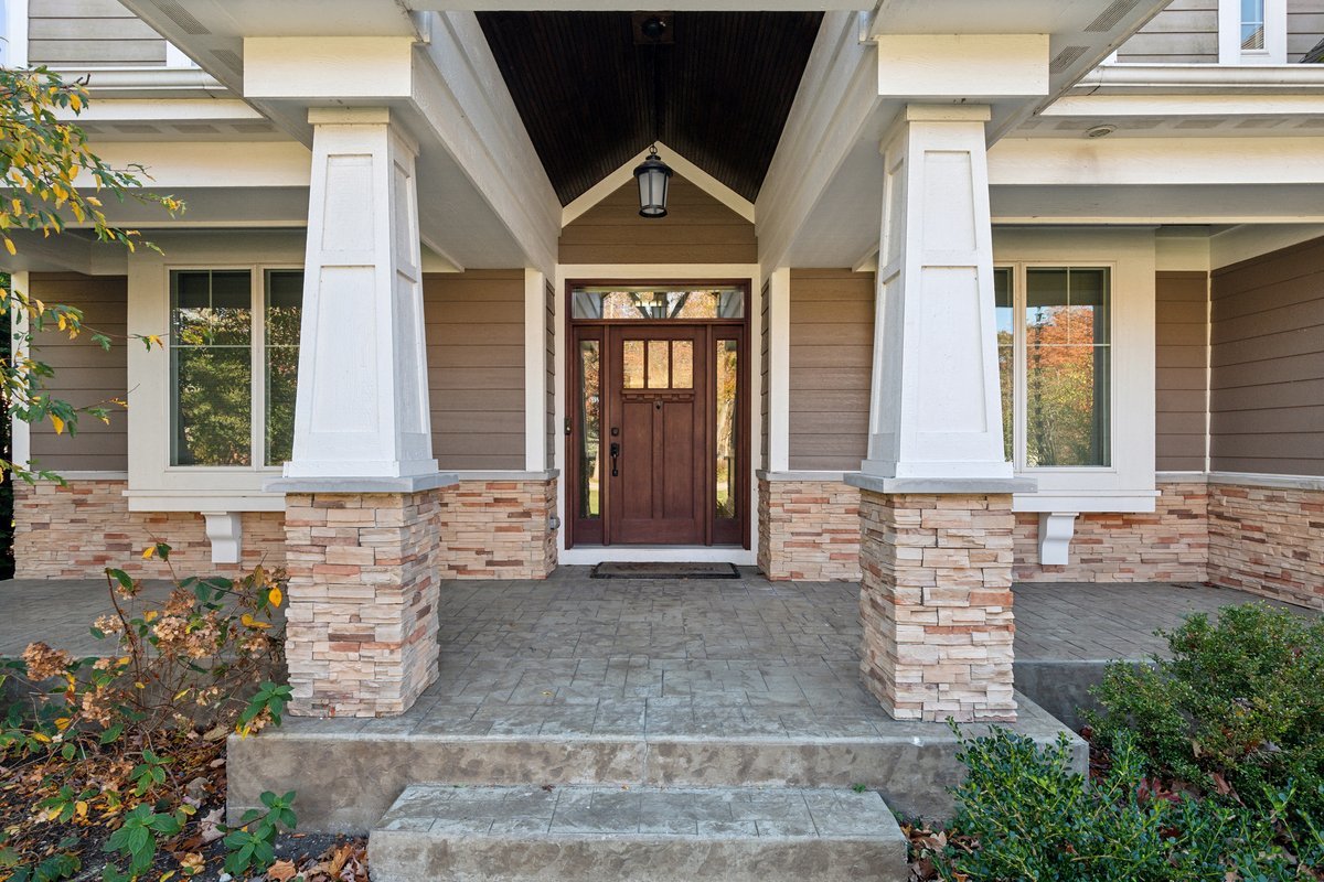 Undisclosed Address Lake Bluff, IL 60044 - Photo 2 of 5 a front view of a house with a yard