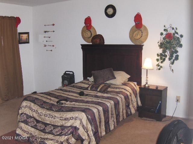 7152 Goodall Mill Road Macon, GA 31216 - Photo 17 of 25 a bedroom with a bed and dresser