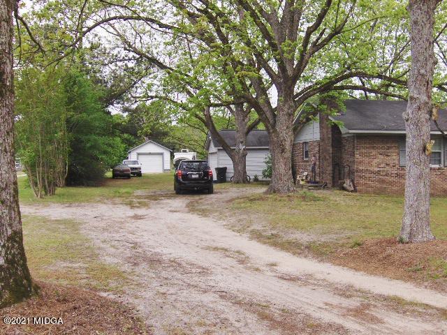 7152 Goodall Mill Road Macon, GA 31216 - Photo 3 of 25 a view of house with outdoor space and trees