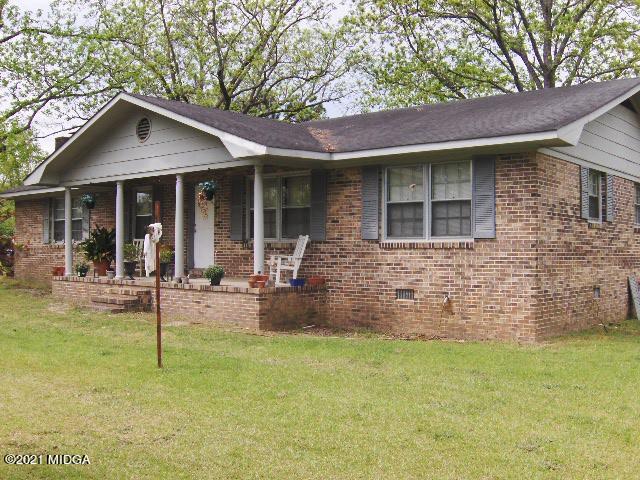 7152 Goodall Mill Road Macon, GA 31216 - Photo 24 of 25 a front view of a house with garden
