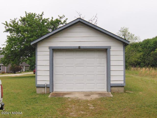 7152 Goodall Mill Road Macon, GA 31216 - Photo 5 of 25 a front view of a house with a yard