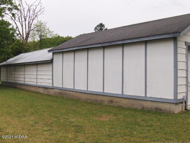 7152 Goodall Mill Road Macon, GA 31216 - Photo 6 of 25 a backyard of a house