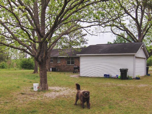 7152 Goodall Mill Road Macon, GA 31216 - Photo 8 of 25 a house with swimming pool in front of it