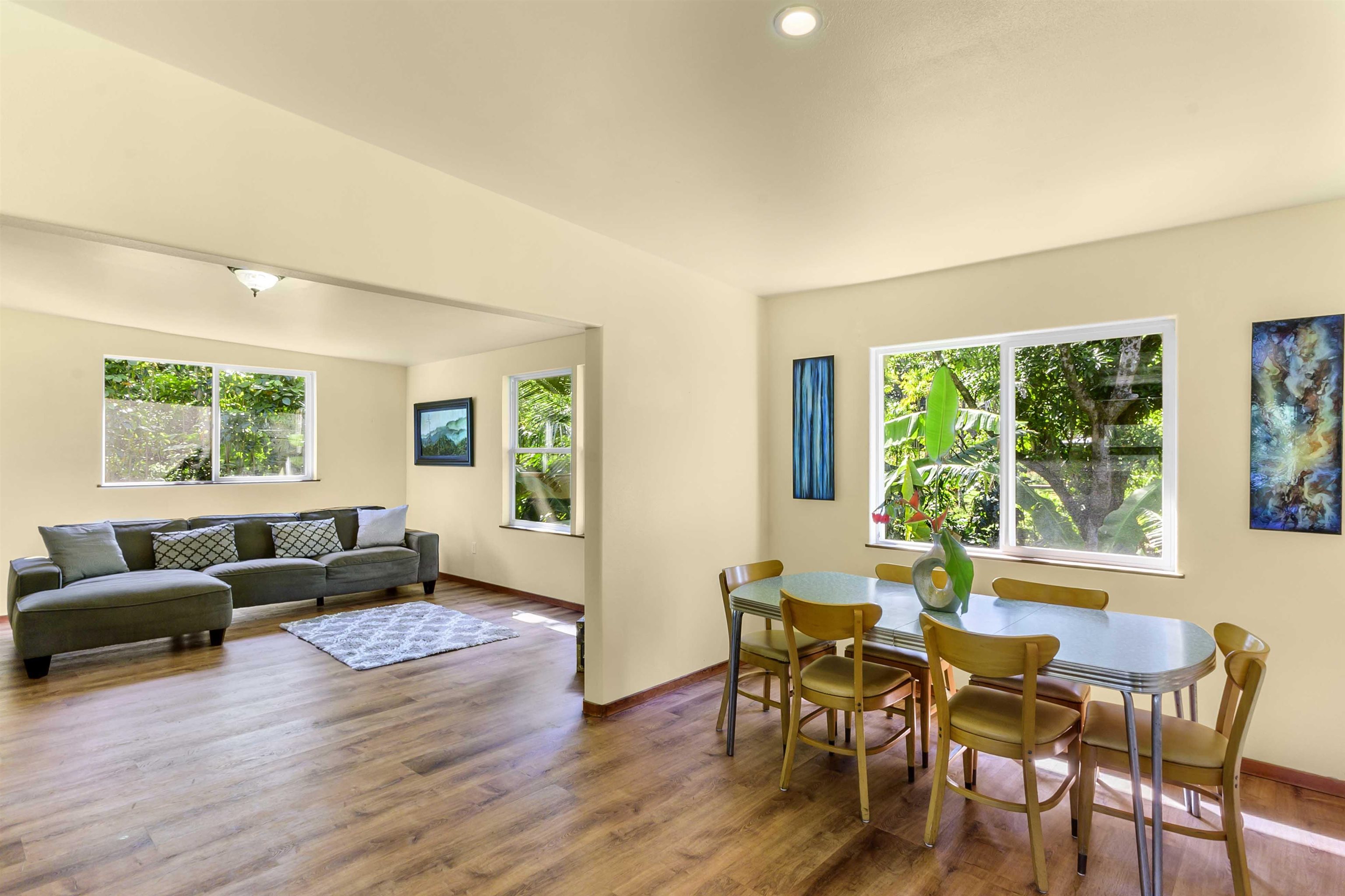 404 Puniawa Road Haiku, HI 96708 - Photo 8 of 36 a view of a livingroom with furniture window and wooden floor