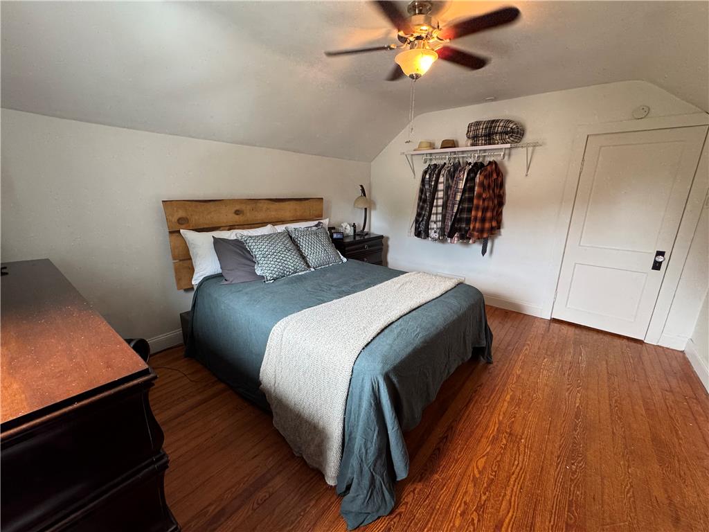 4425 Vera Cruz Road Center Valley, PA 18034 - Photo 6 of 17 Sloped ceilings and rich hardwood flooring define this comfortable bedroom space.
