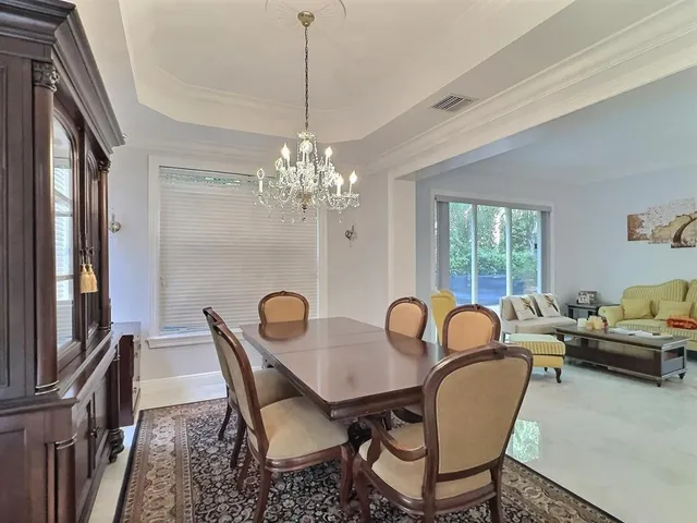 a view of empty room with windows