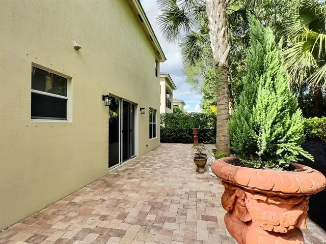 a utility room with sink dryer and washer