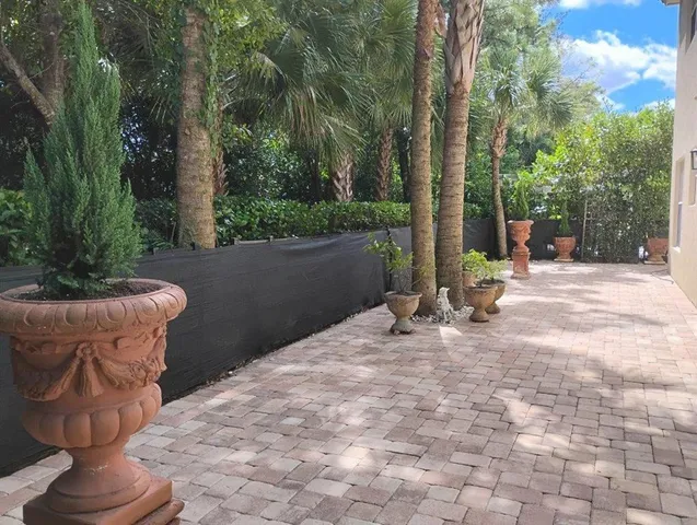 a view of hall way with furniture