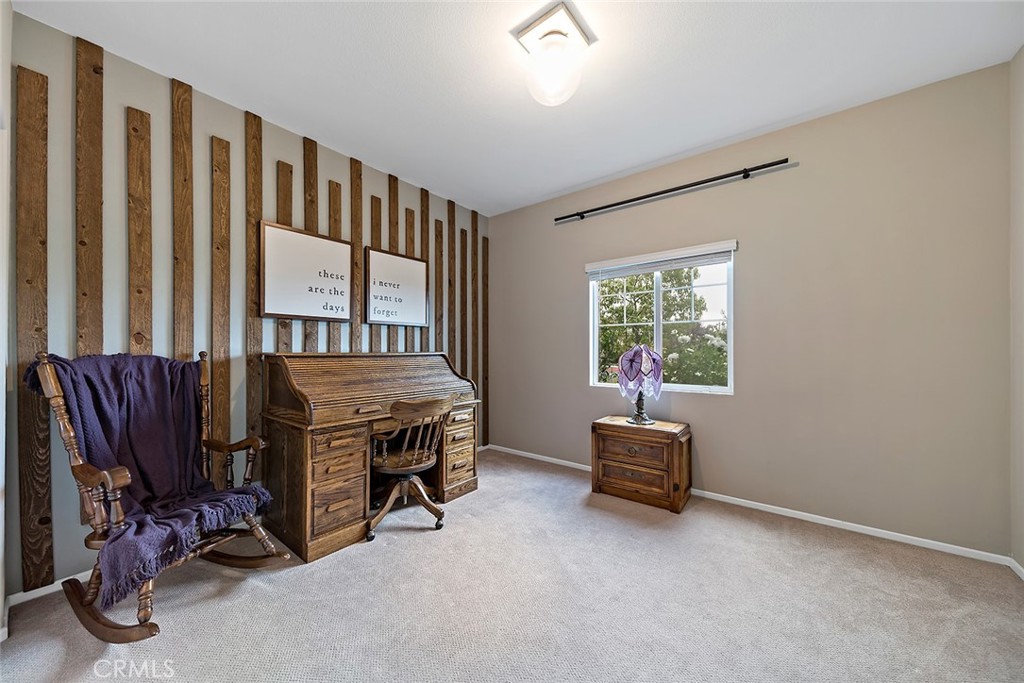 1189 Heritage Drive Calimesa, CA 92320 - Photo 14 of 36 a bedroom with furniture and a window