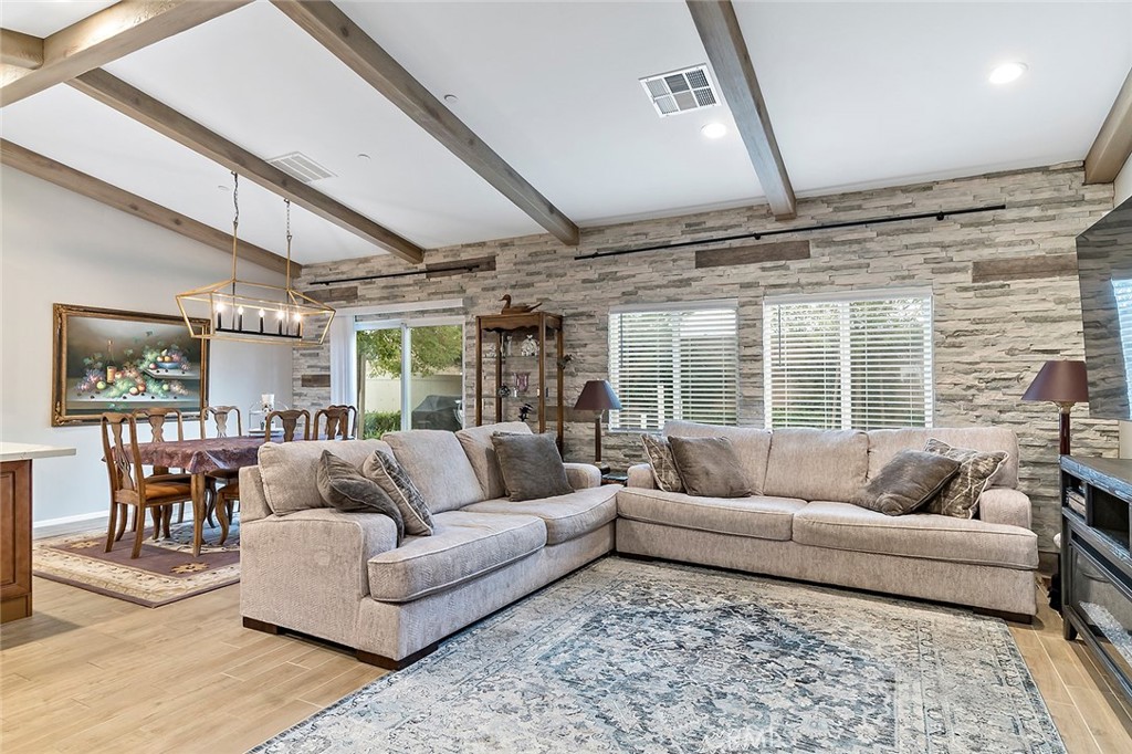 1189 Heritage Drive Calimesa, CA 92320 - Photo 3 of 36 a living room with furniture and a large window