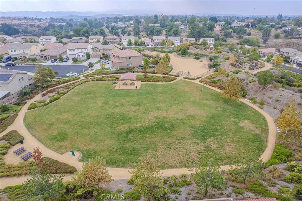 1189 Heritage Drive Calimesa, CA 92320 - Photo 33 of 36 an aerial view of residential houses with outdoor space