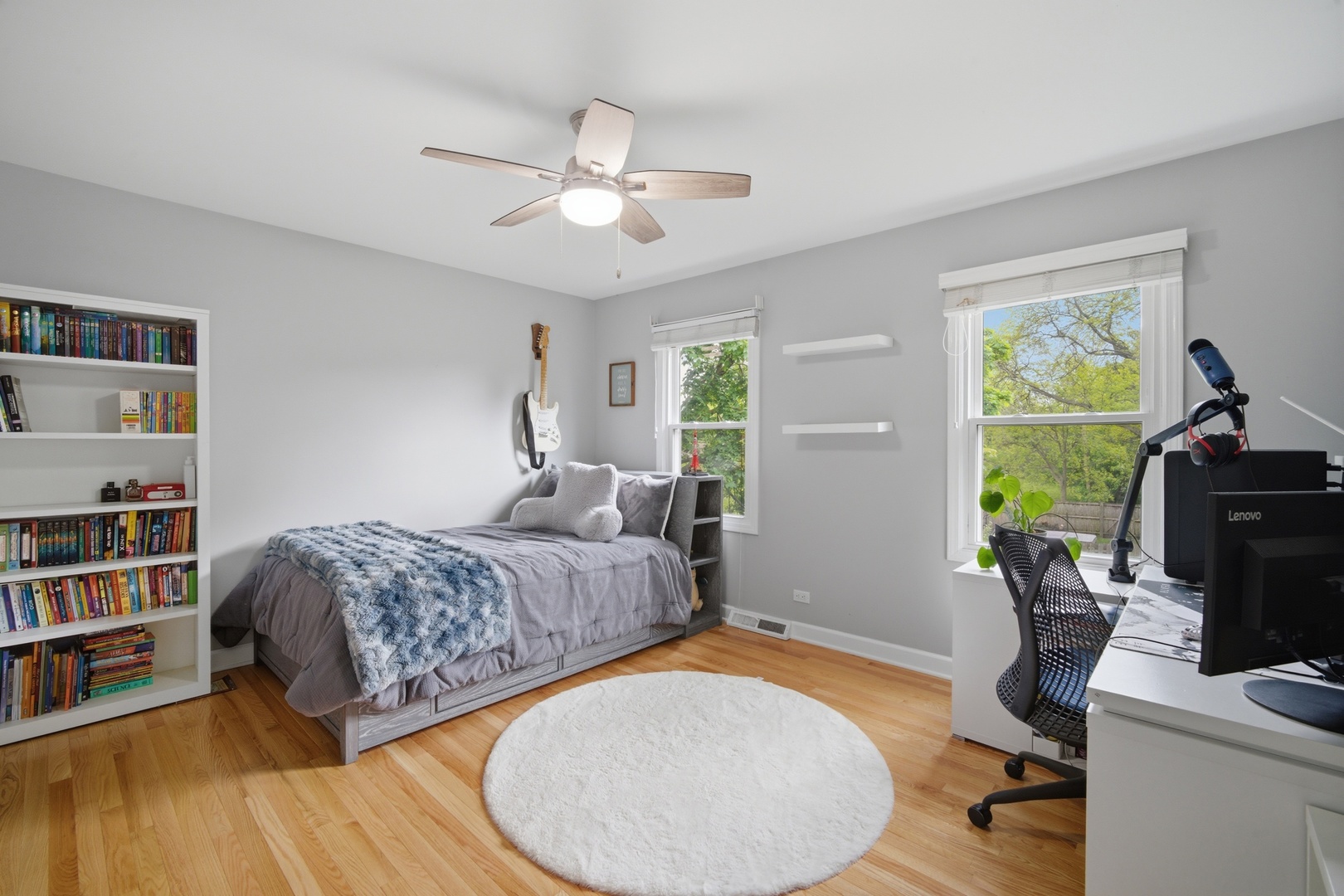 2831 Farmington Road Northbrook, IL 60062 - Photo 23 of 33 a bedroom with bed and a bookshelf