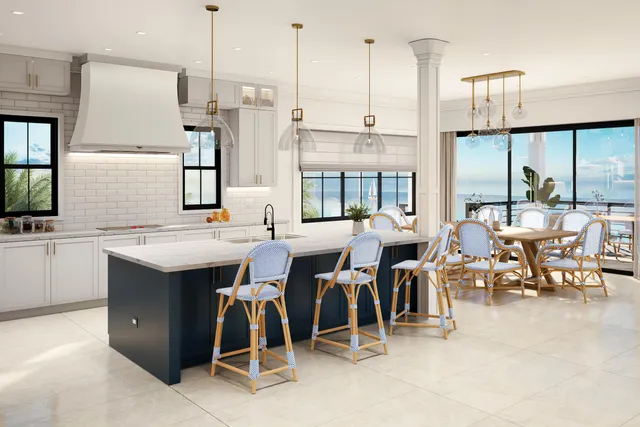 a group of people sitting in a kitchen
