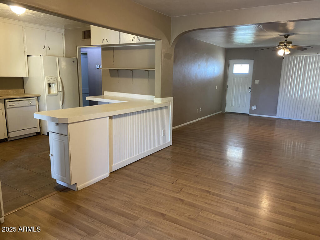 822 West Missouri Avenue Phoenix, AZ 85013 - Photo 13 of 35 a kitchen with stainless steel appliances a refrigerator and a stove