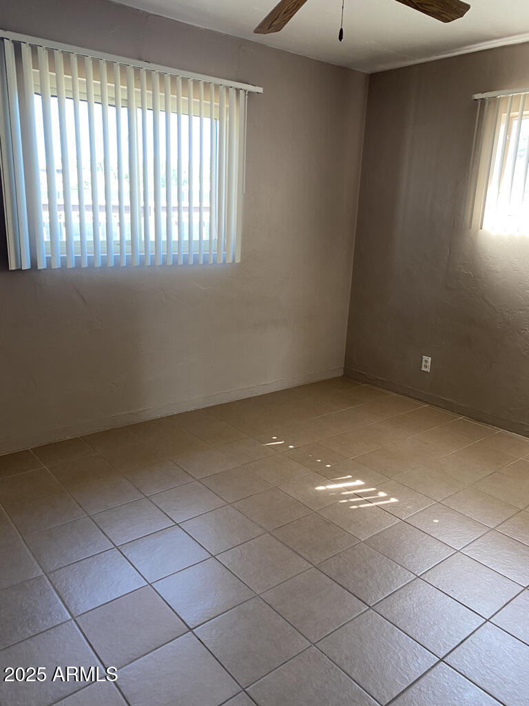 822 West Missouri Avenue Phoenix, AZ 85013 - Photo 21 of 35 a view of an empty room with a window