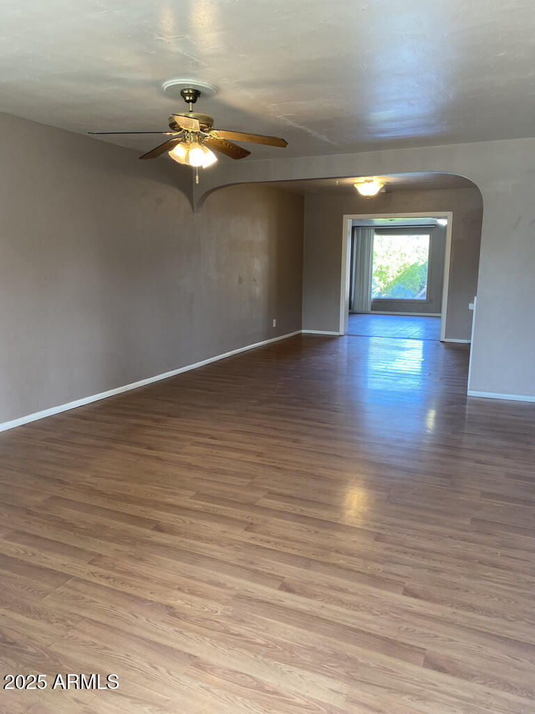 822 West Missouri Avenue Phoenix, AZ 85013 - Photo 4 of 35 a view of a livingroom with wooden floor