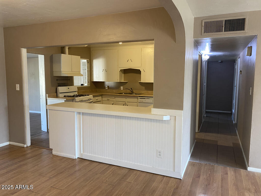 822 West Missouri Avenue Phoenix, AZ 85013 - Photo 7 of 35 a bathroom with a sink and a mirror