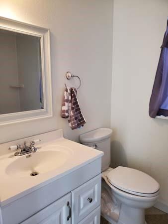 921 West Oak Street Denton, TX 76201 - Photo 4 of 23 a bathroom with a sink and a toilet