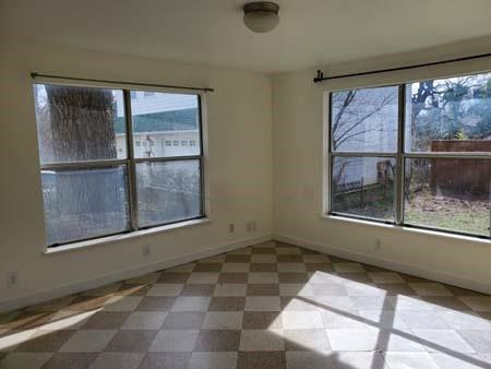 921 West Oak Street Denton, TX 76201 - Photo 5 of 23 a view of an empty room with a window
