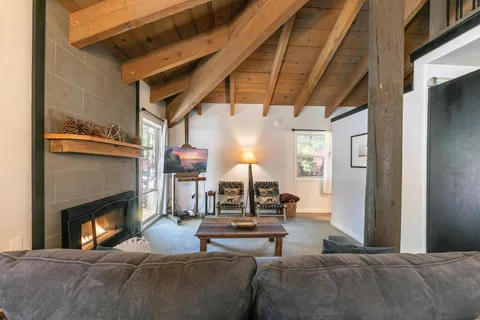 a view of a living room and entry way