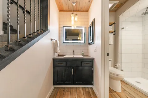 a bathroom with a shower and bathtub