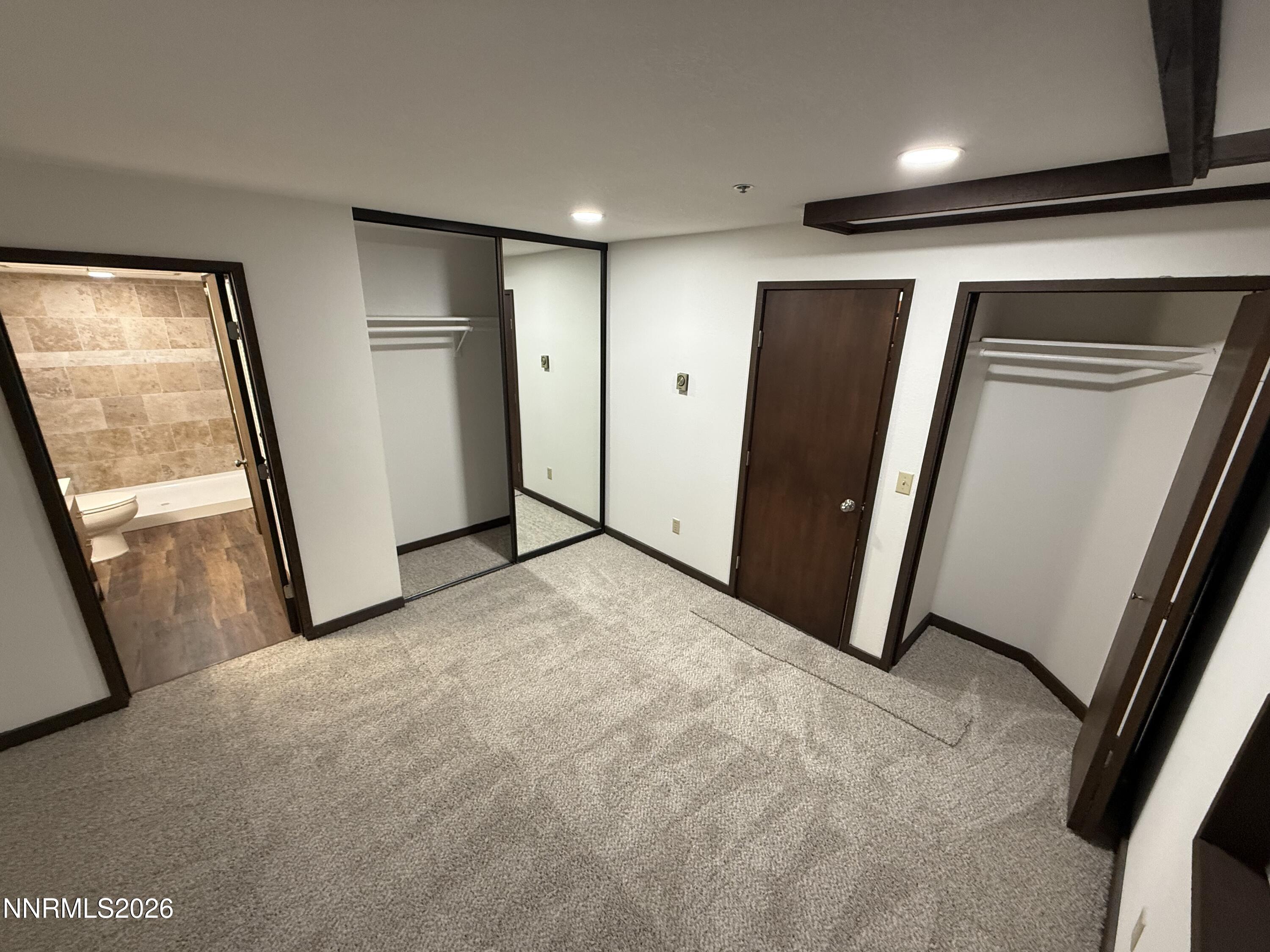 333 Ski Way, Unit 279 Incline Village, NV 89451 - Photo 15 of 43 a view of hallway with stainless steel appliances wooden floor and door