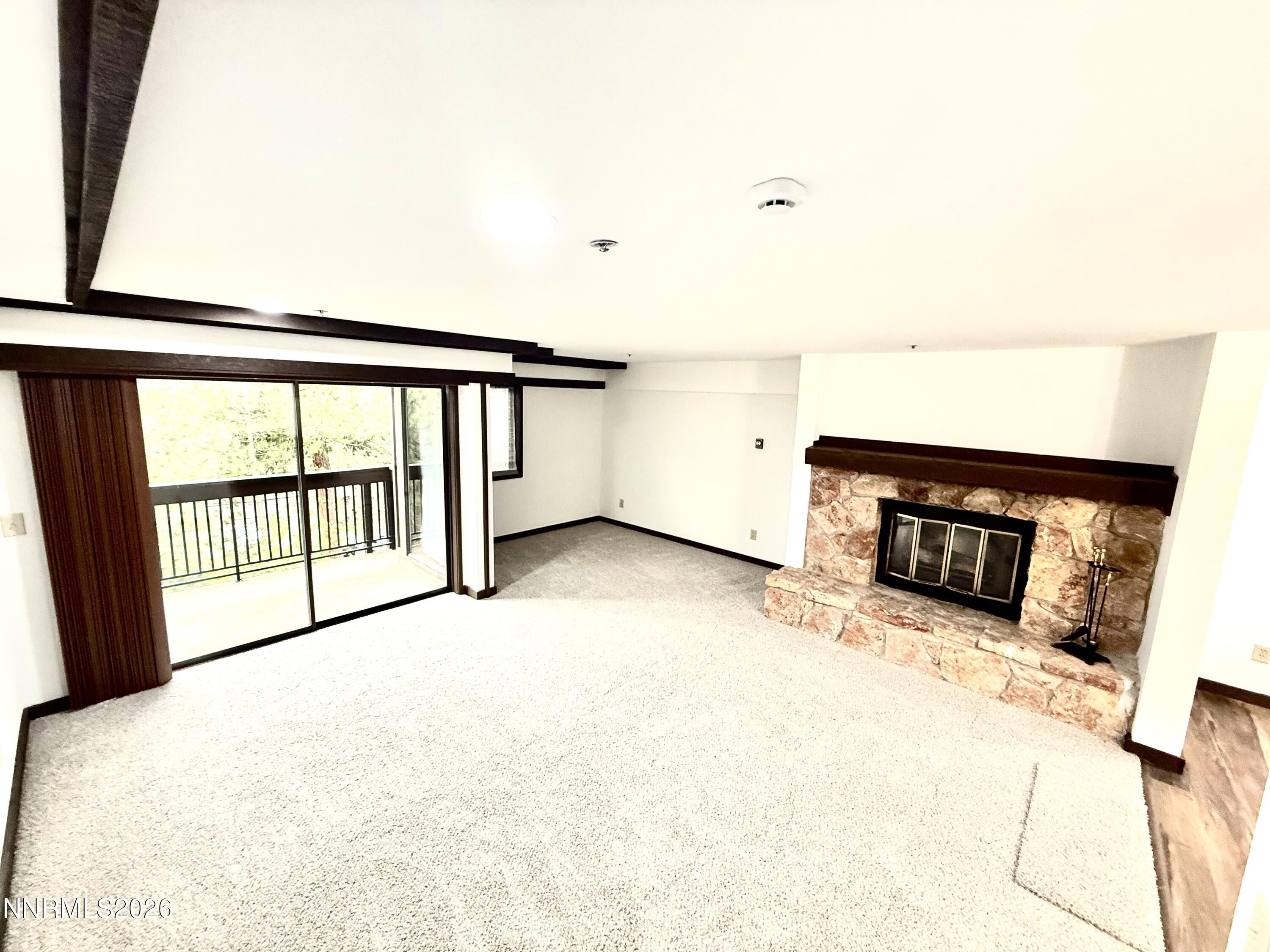 333 Ski Way, Unit 279 Incline Village, NV 89451 - Photo 26 of 43 a view of an empty room with a fireplace