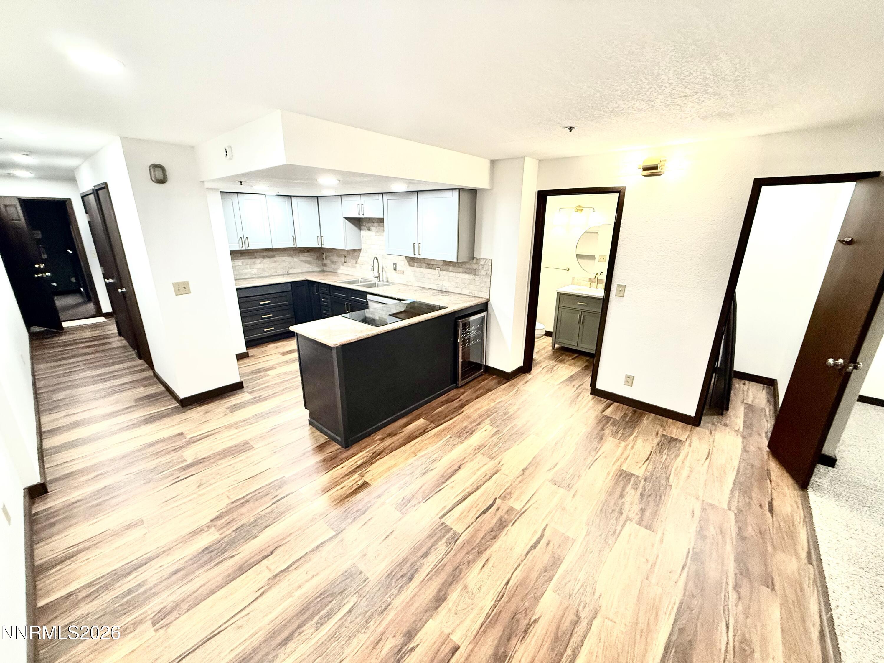 333 Ski Way, Unit 279 Incline Village, NV 89451 - Photo 7 of 43 a large room with wooden floor and furniture