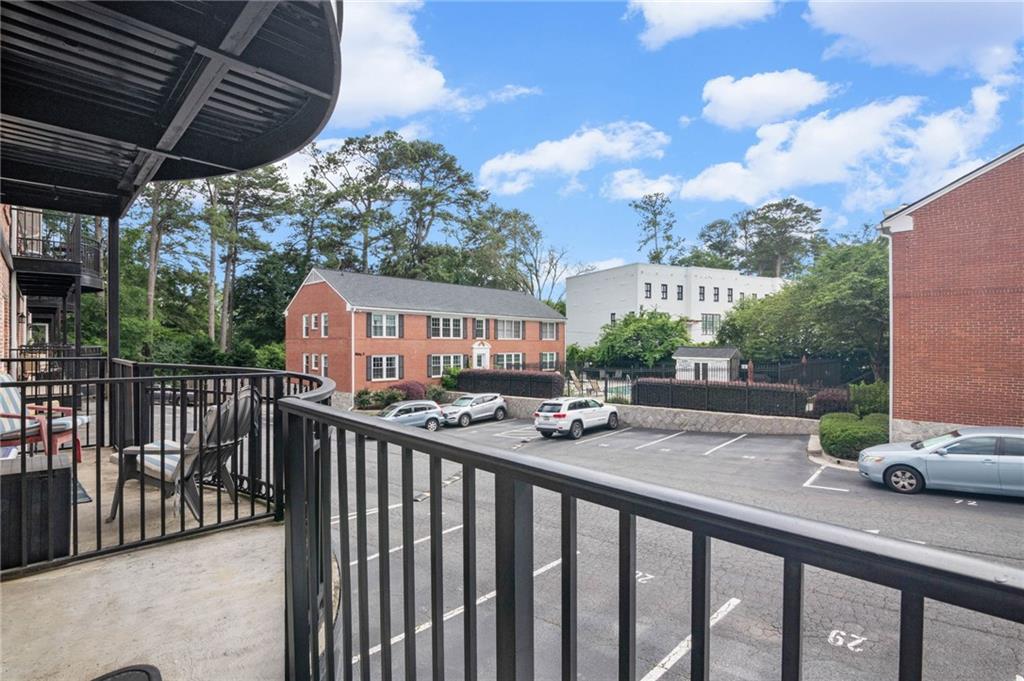3675 Peachtree Road Northeast, Unit 45 Atlanta, GA 30319 - Photo 31 of 42 a view of a street with wooden fence