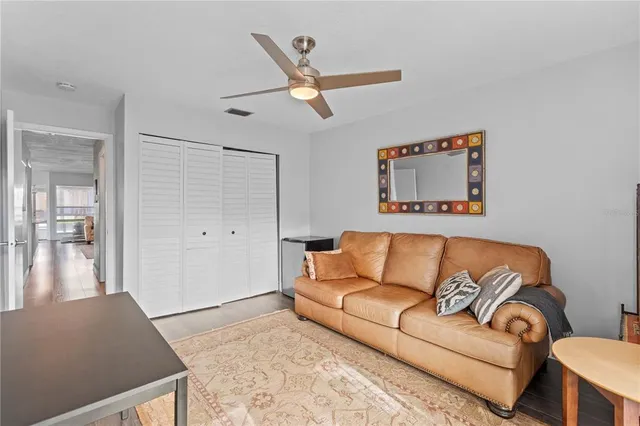 a living room with furniture and a window