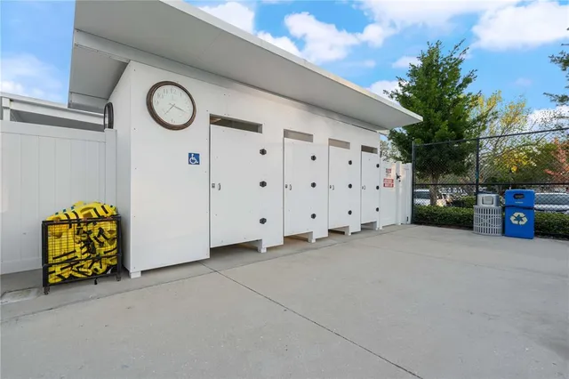 a view of a swimming pool with a patio