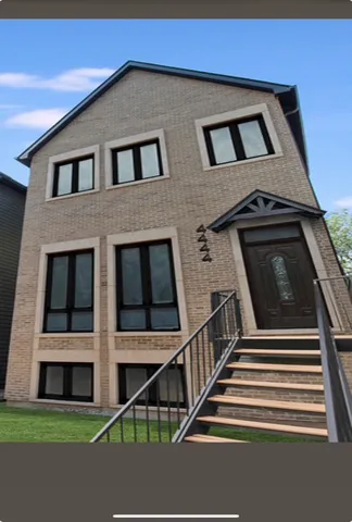a front view of a house with windows
