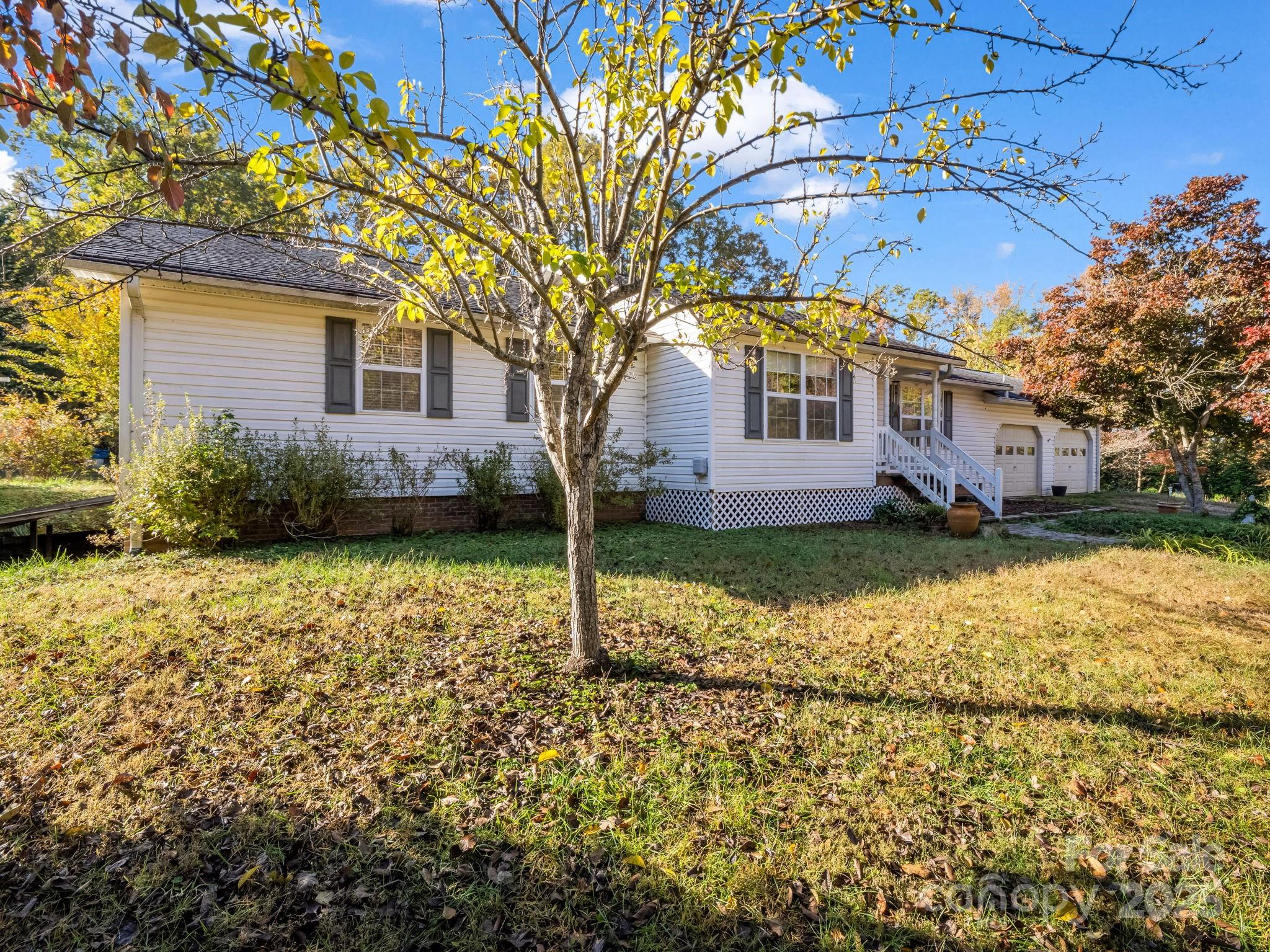 262 Daisy Lane Bostic, NC 28018 - Photo 2 of 48 a view of a house with a yard
