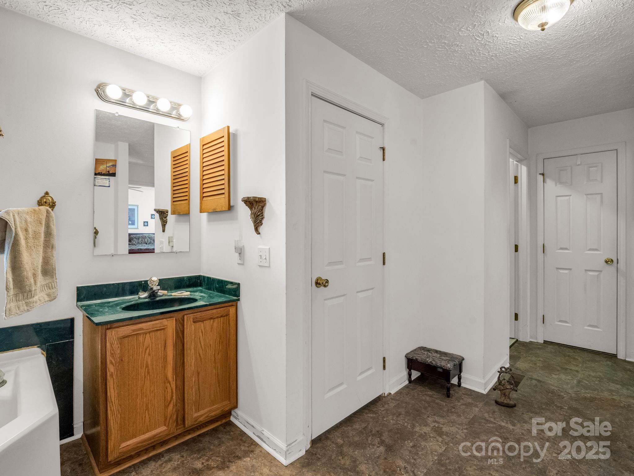 262 Daisy Lane Bostic, NC 28018 - Photo 21 of 48 a kitchen with a sink and a stove top oven