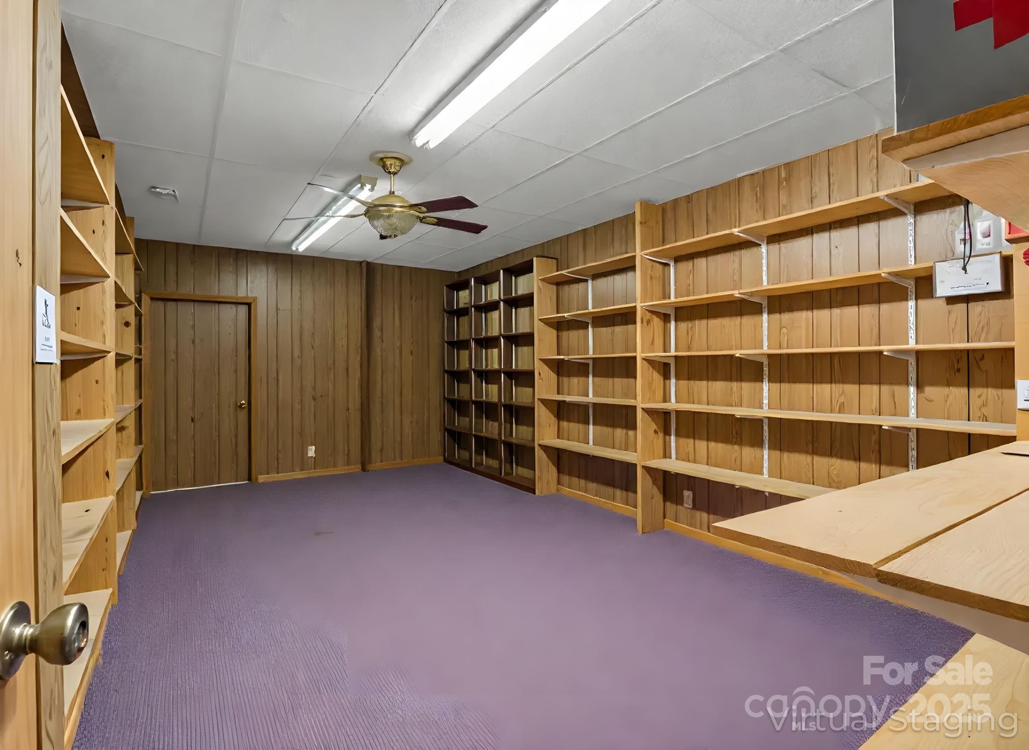262 Daisy Lane Bostic, NC 28018 - Photo 26 of 48 a view of an empty room with a fireplace and a window