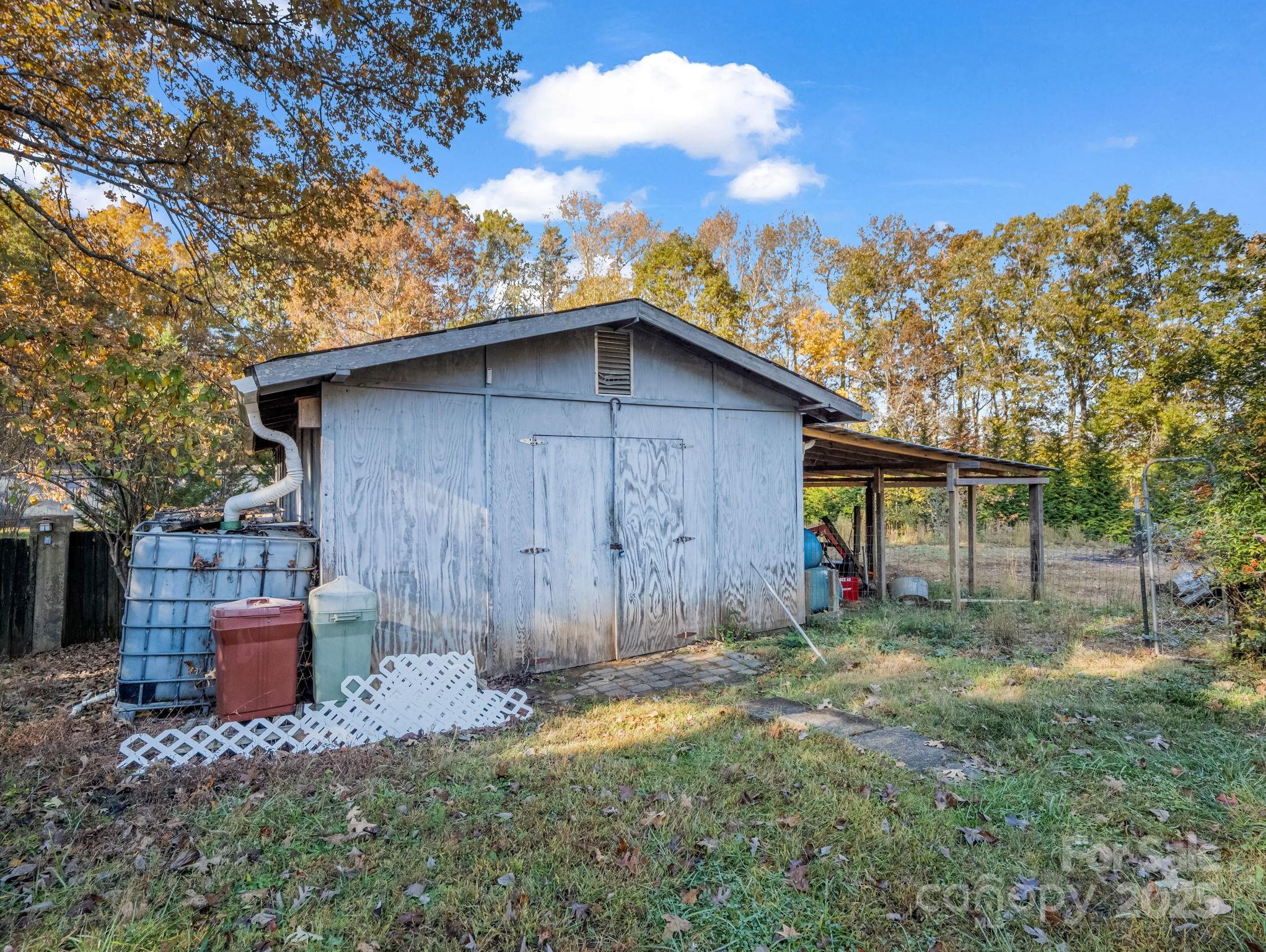 262 Daisy Lane Bostic, NC 28018 - Photo 32 of 48 a front view of a house with a yard