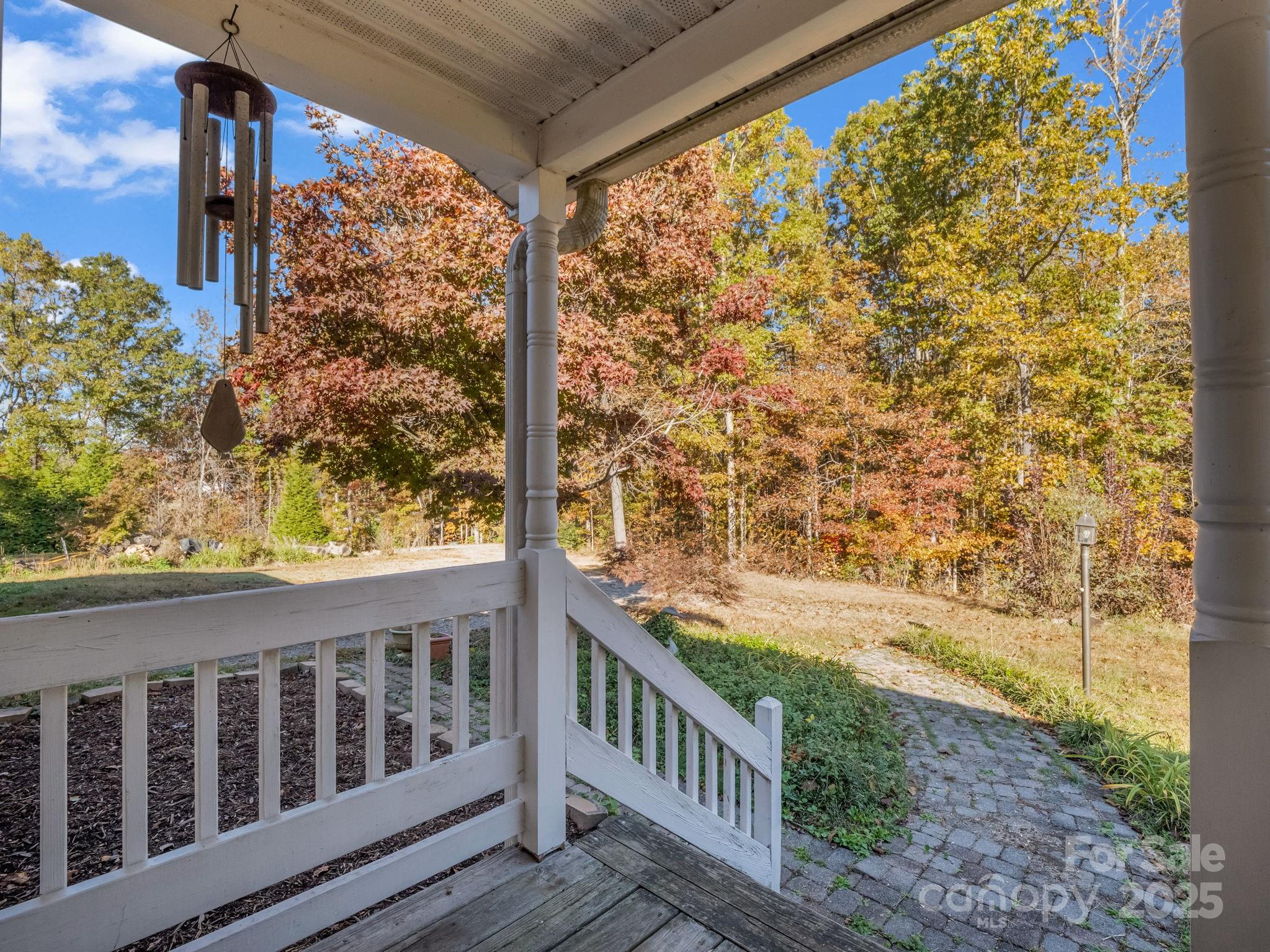 262 Daisy Lane Bostic, NC 28018 - Photo 4 of 48 a view of a porch with a yard