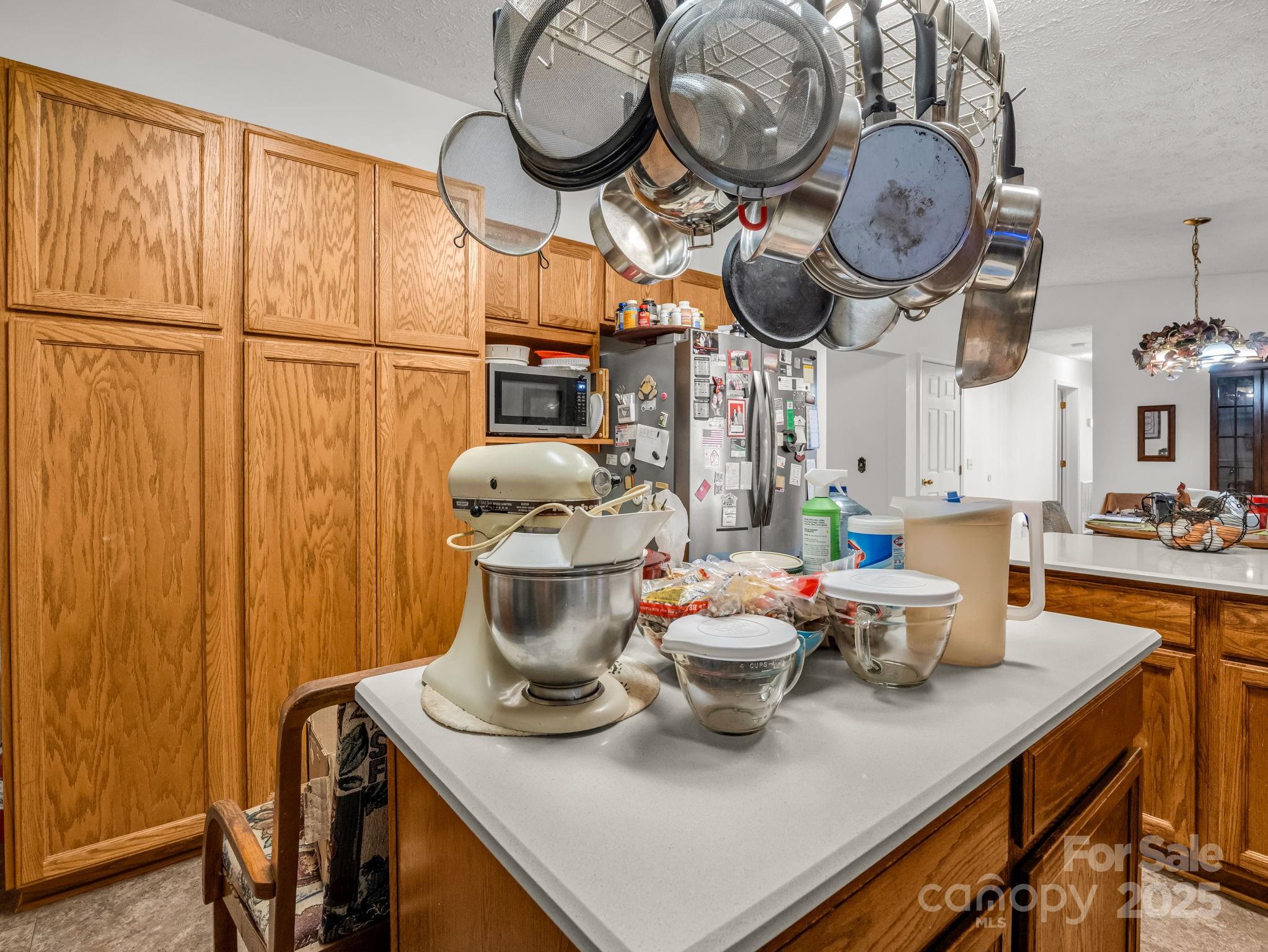 262 Daisy Lane Bostic, NC 28018 - Photo 45 of 48 a kitchen with a table and a stove