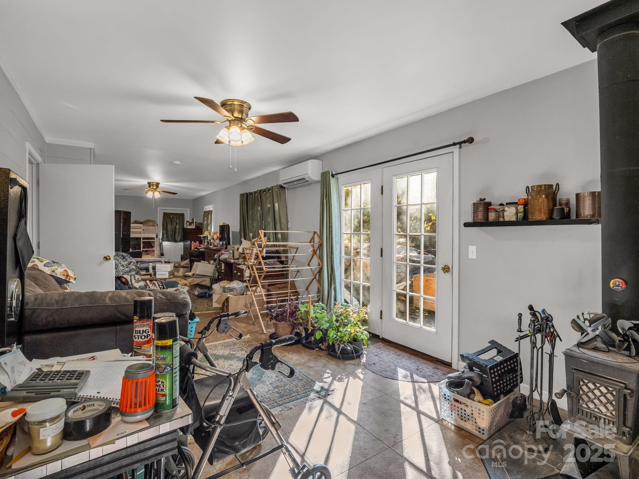 262 Daisy Lane Bostic, NC 28018 - Photo 48 of 48 a living room with lots of furniture and gym equipment