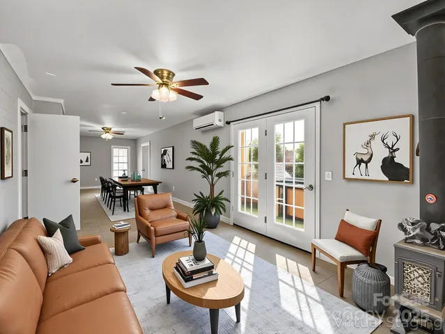 a view of workspace with furniture and window