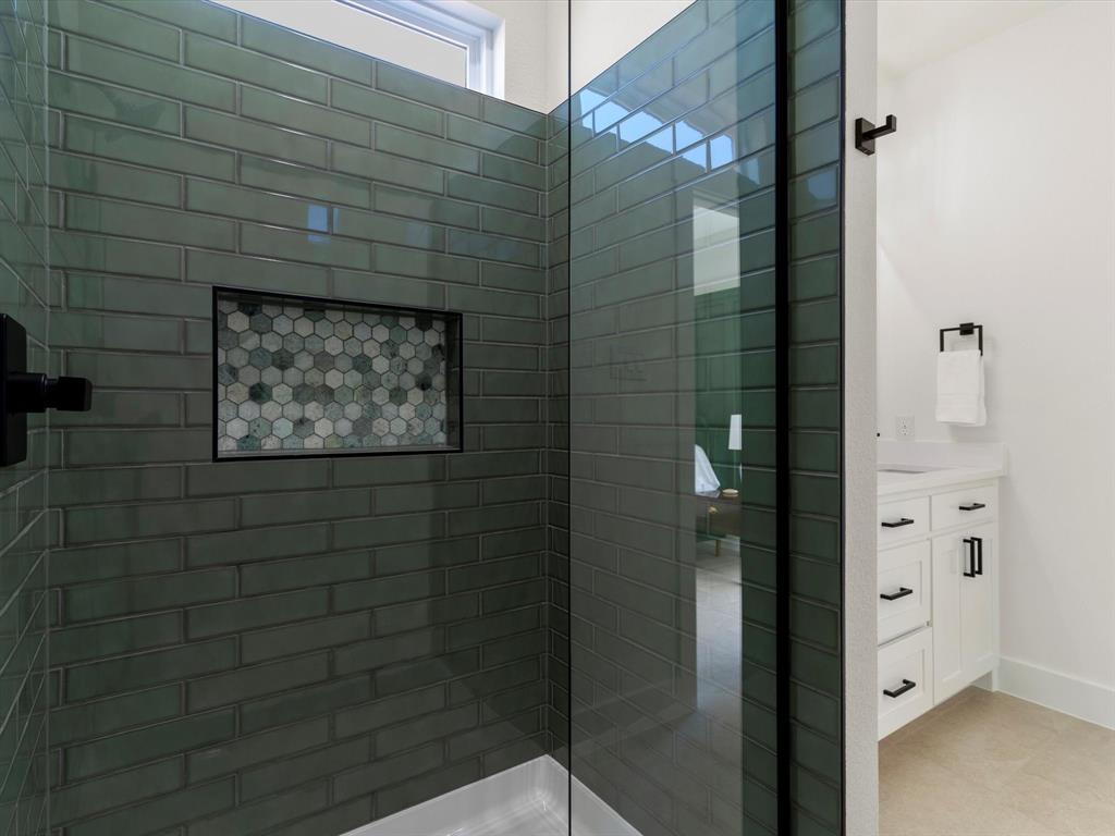 1623 County Road 4764 Boyd, TX 76023 - Photo 13 of 29 a bathroom with a shower and a sink